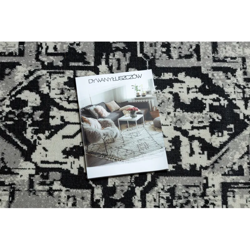 Eleganter Vintage-Teppich in Grau und Schwarz, ideal für das Wohnzimmer