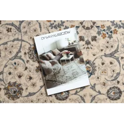 Stylvoller Wollteppich in Beige und Blau, perfekt für moderne Räume