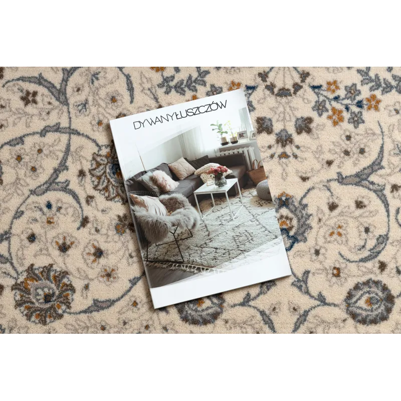 Stylvoller Wollteppich in Beige und Blau, perfekt für moderne Räume